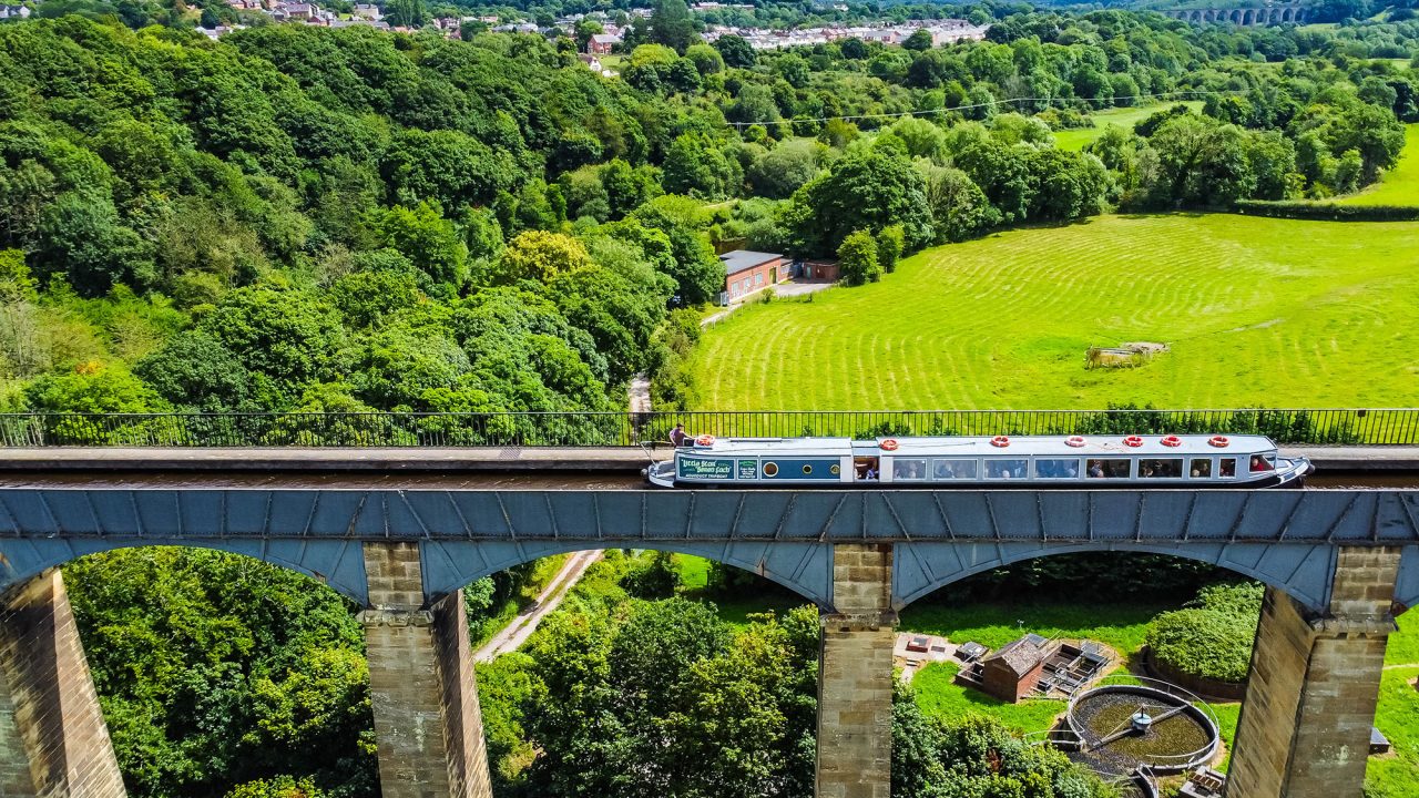 Angle Welsh narrow boat across Pontcysyllte aqueduct