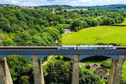 Angle Welsh narrow boat across Pontcysyllte aqueduct